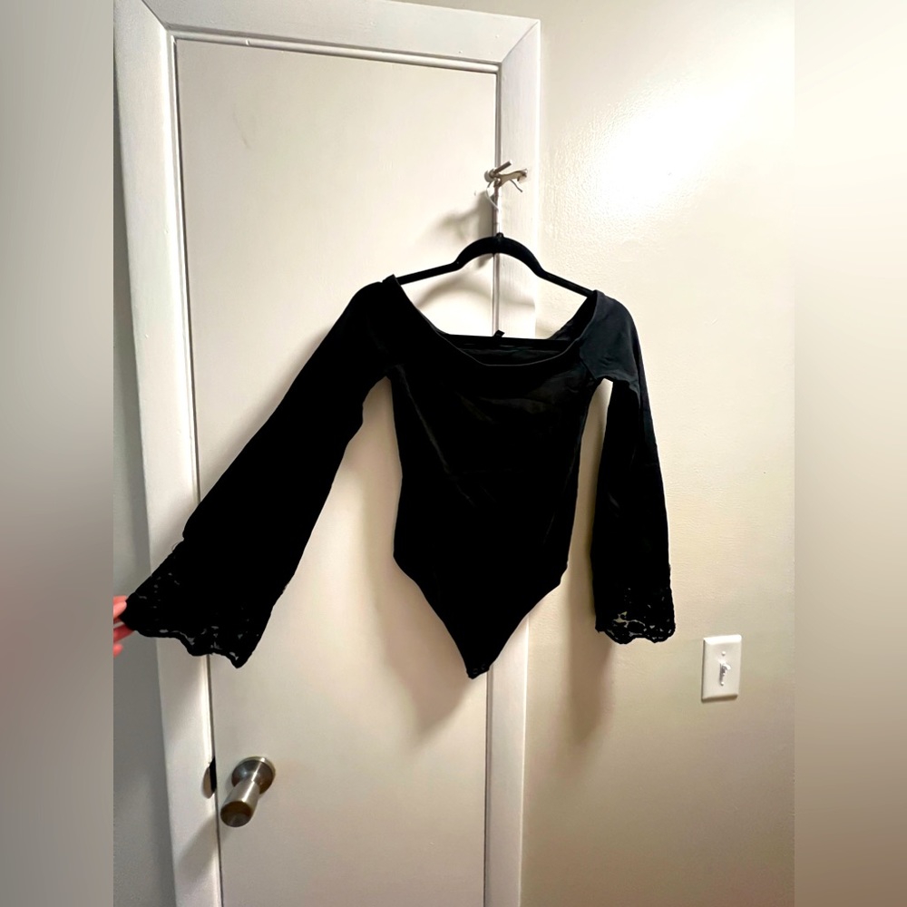 Black onesie express top